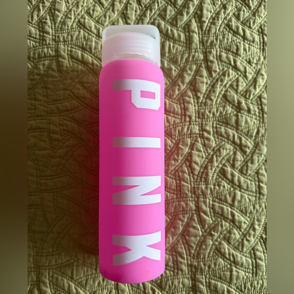 Victoria's Secret Pink Glass Water Bottle with silicone sleeve.